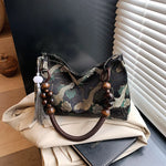 Elara Versatile Embroidered Tassel-Detail Crossbody Bag – primary product view