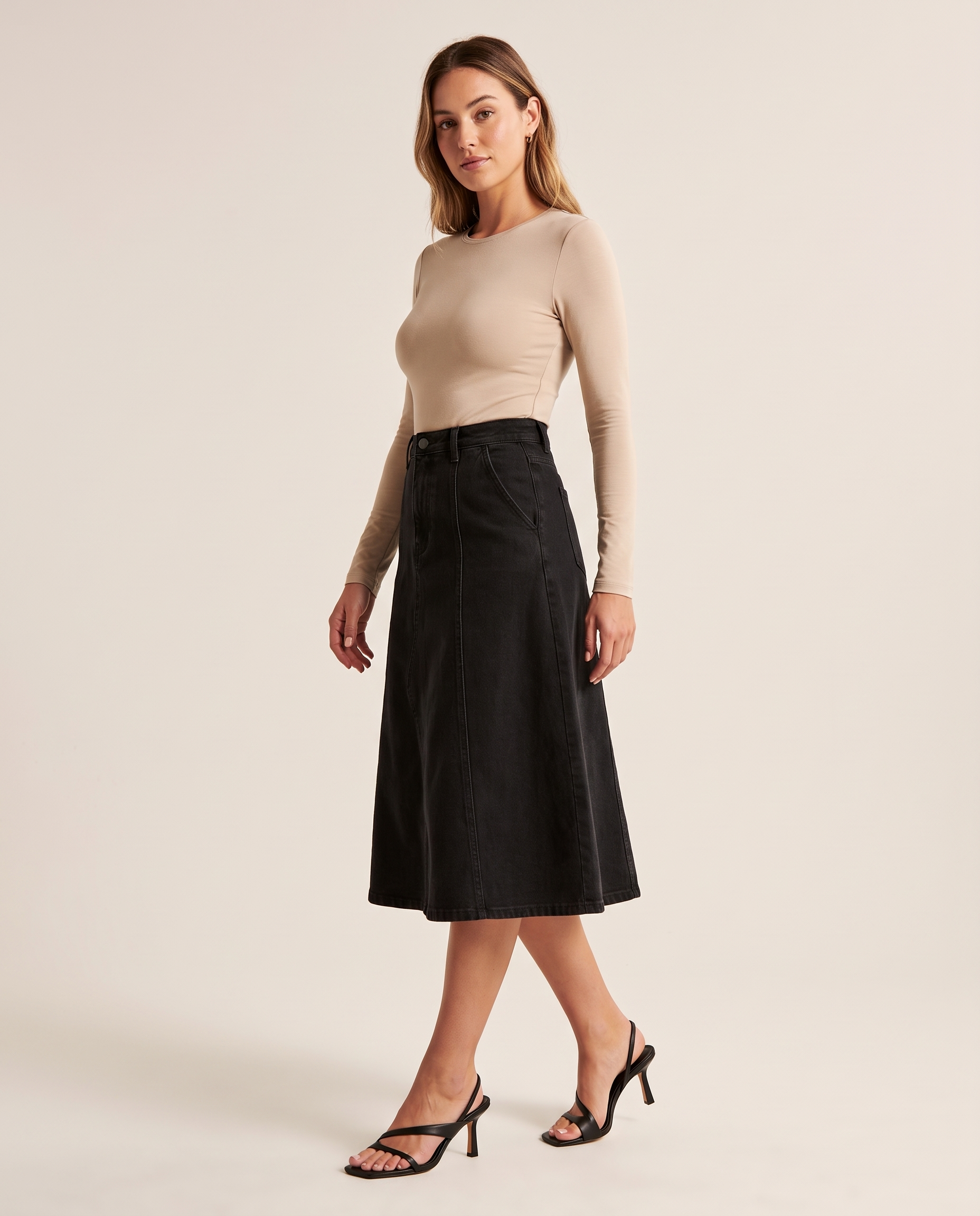 Black A-Line Denim Midi Skirt — three-quarter view