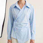 Arden Asymmetric Long-Sleeve Polo Blouse – studio front view
