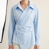 Arden Asymmetric Long-Sleeve Polo Blouse – studio front view