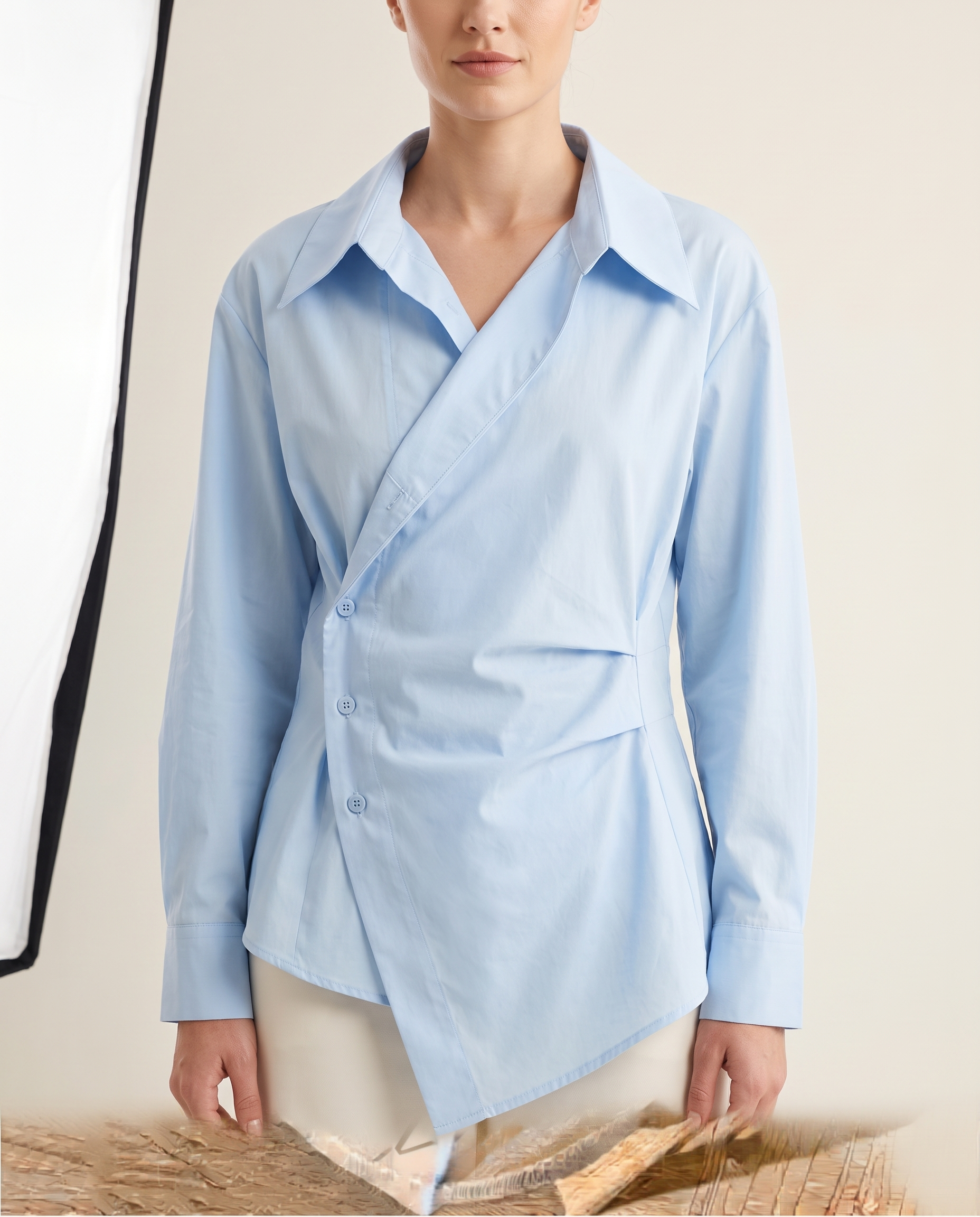 Arden Asymmetric Long-Sleeve Polo Blouse – studio front view