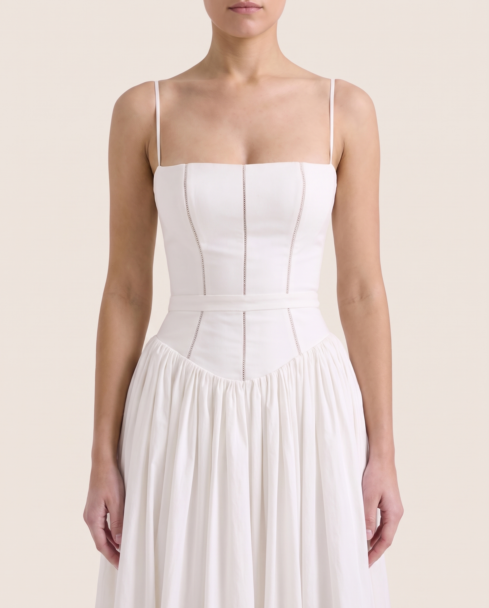 Arvelle | Pleated Strapless Midi Wedding Guest Gowns — White — fabric detail
