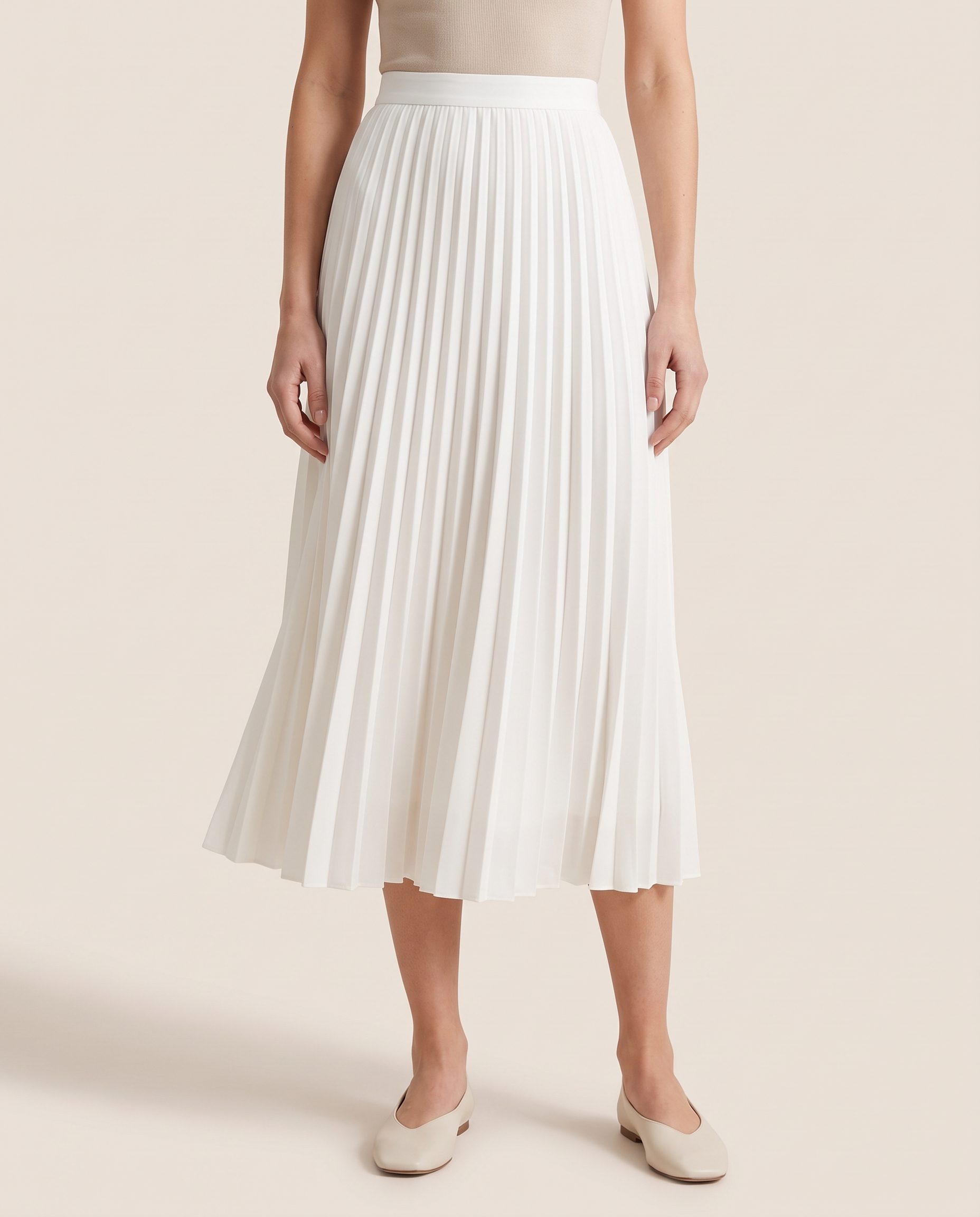 Black Pleated Midi Skirt — White studio front