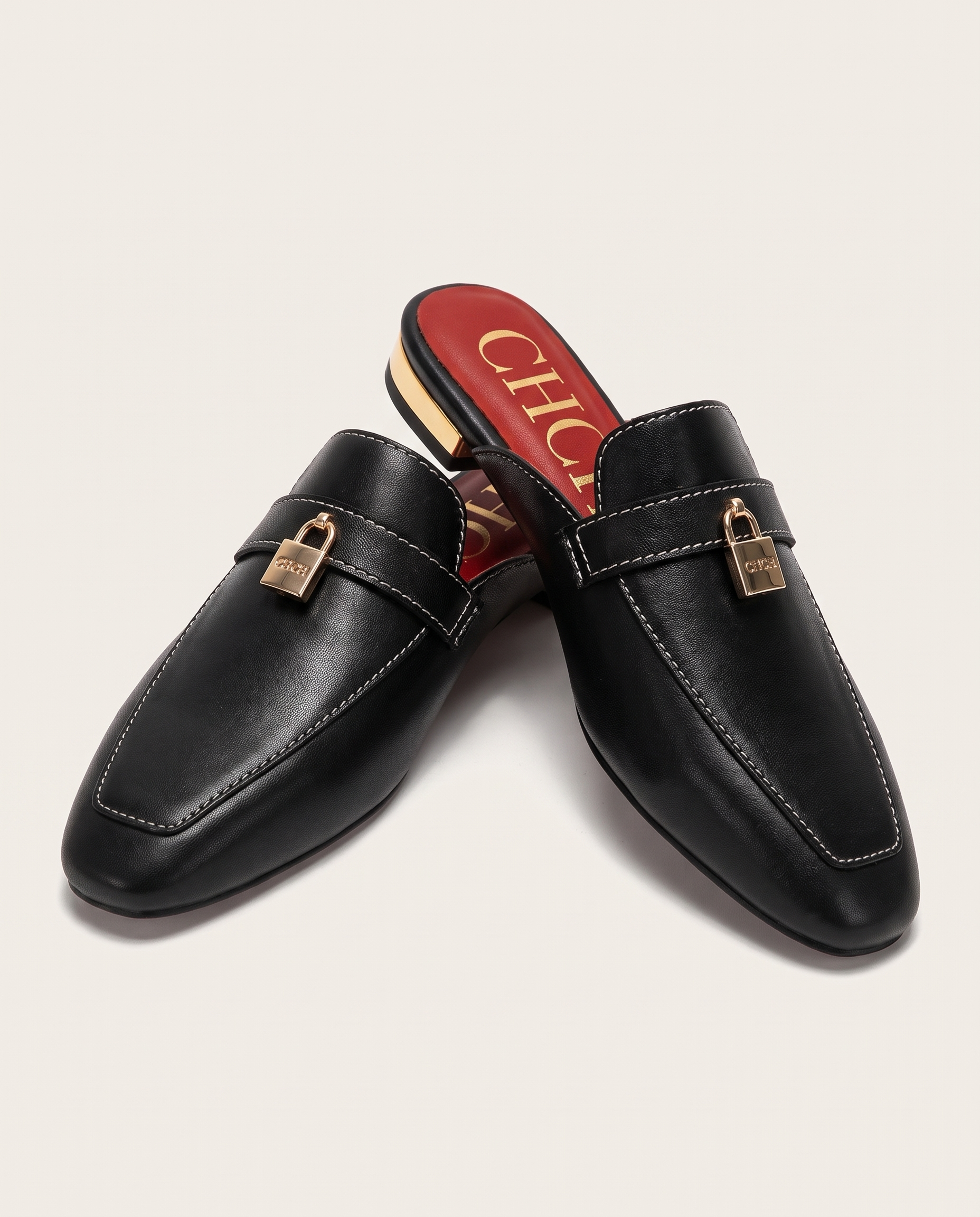 Calypso Classic Round-Toe Flat Mules — detail view