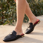 Calypso Classic Round-Toe Flat Mules — lifestyle view