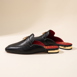 Calypso Classic Round-Toe Flat Mules — side view