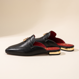 Calypso Classic Round-Toe Flat Mules — side view