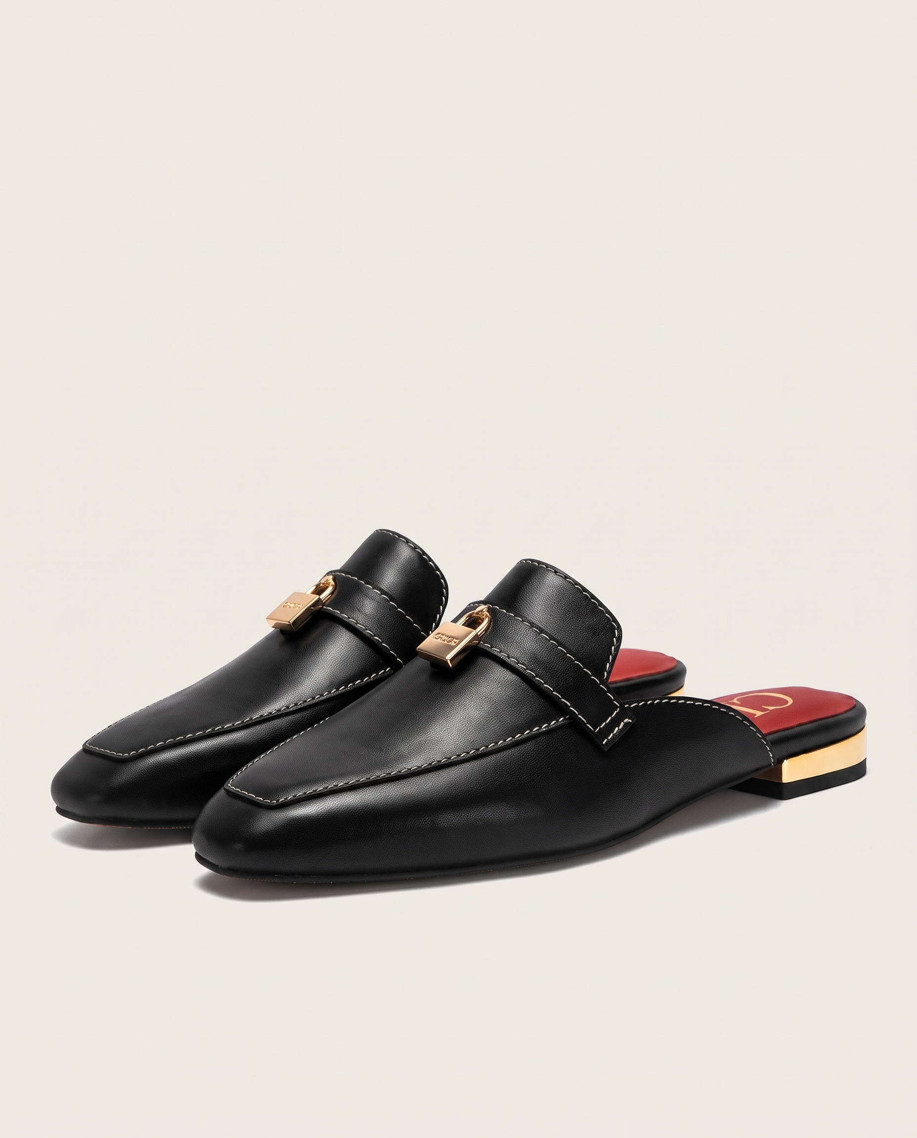 Calypso Classic Round-Toe Flat Mules — Black variant