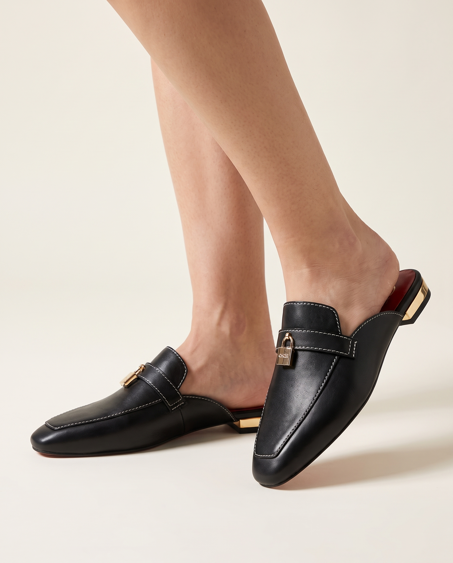 Calypso Classic Round-Toe Flat Mules — Australian studio lifestyle view