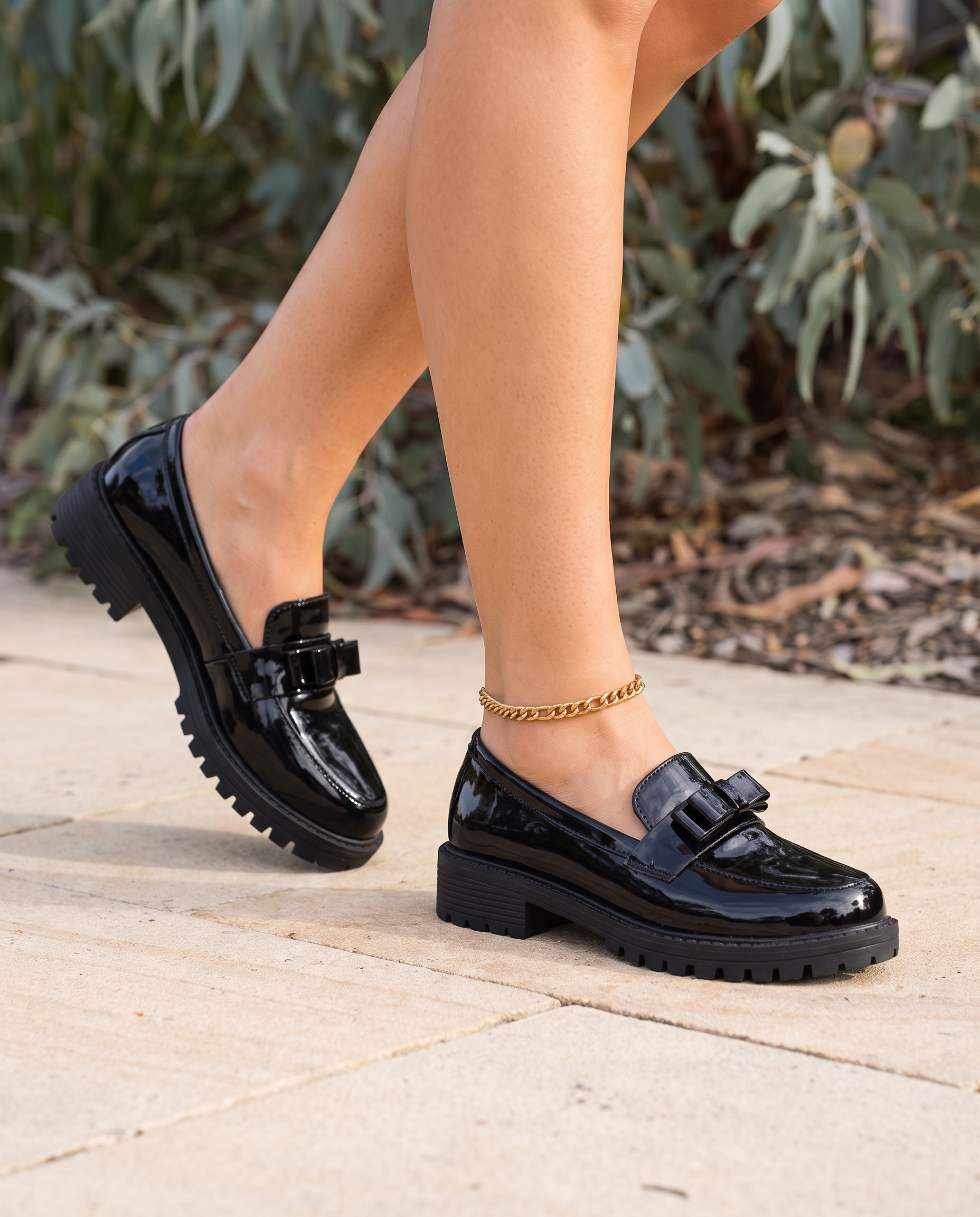 Classic Low-Heel Bow-Detail Patent Loafers — lifestyle view