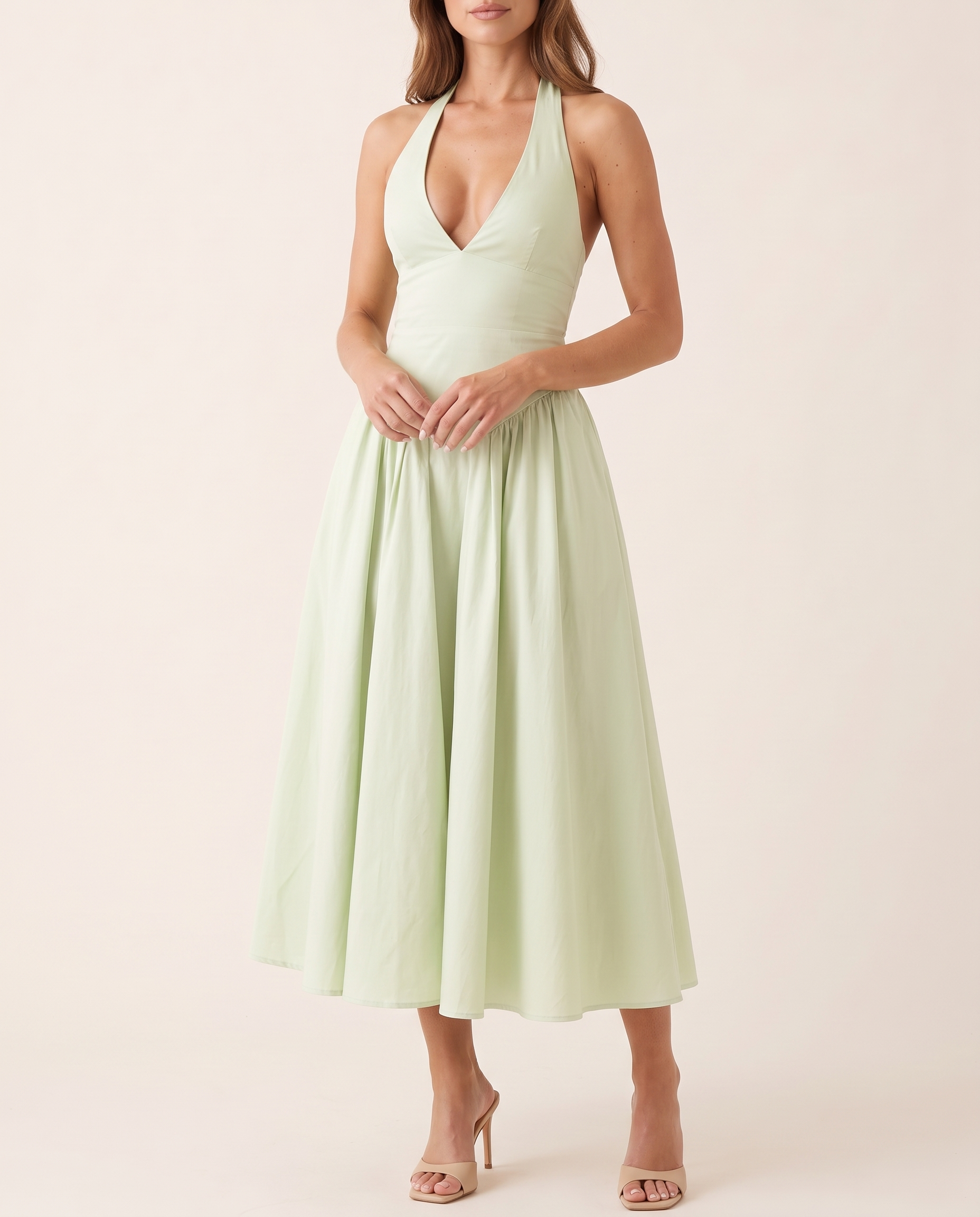 Elara Backless Halter A-Line Midi Dress – Green studio variant