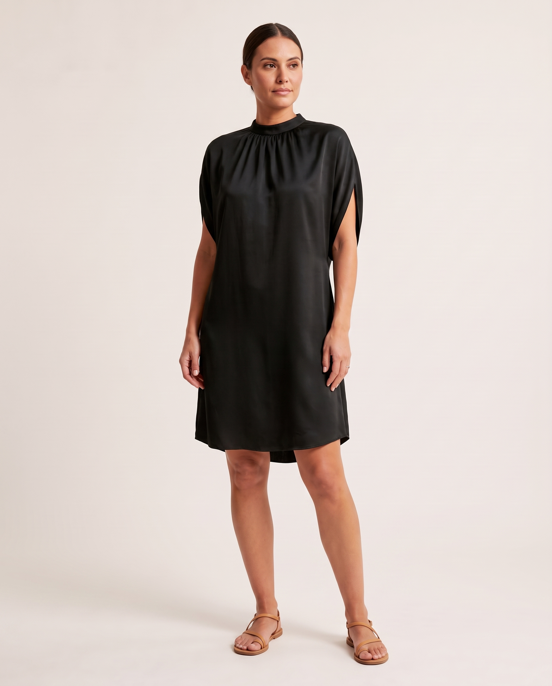 Evangeline | Figure-Flattering V-Neck Dress — Black — studio three-quarter
