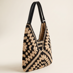 Ilana woven straw bag – studio side view