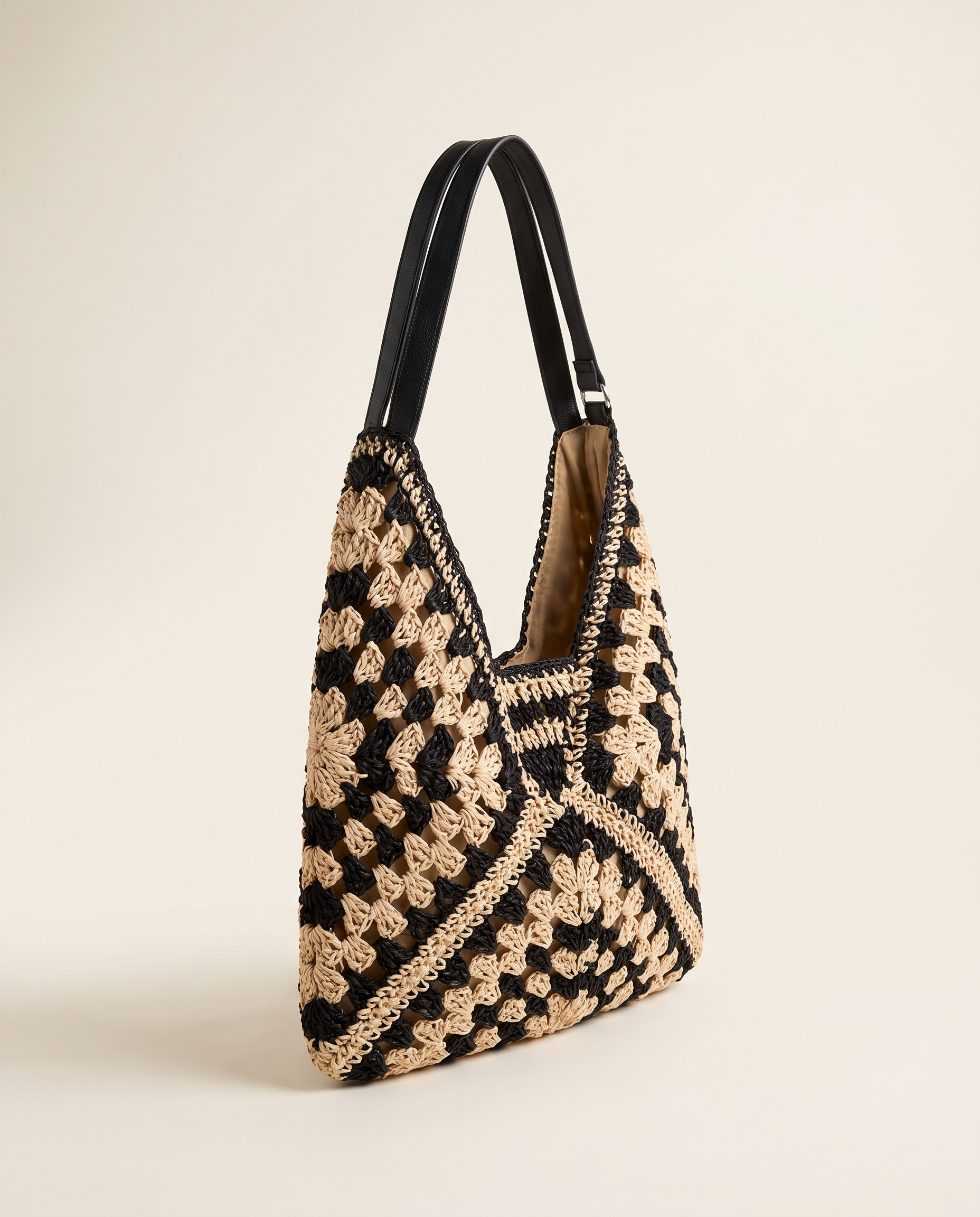 Ilana woven straw bag – studio side view