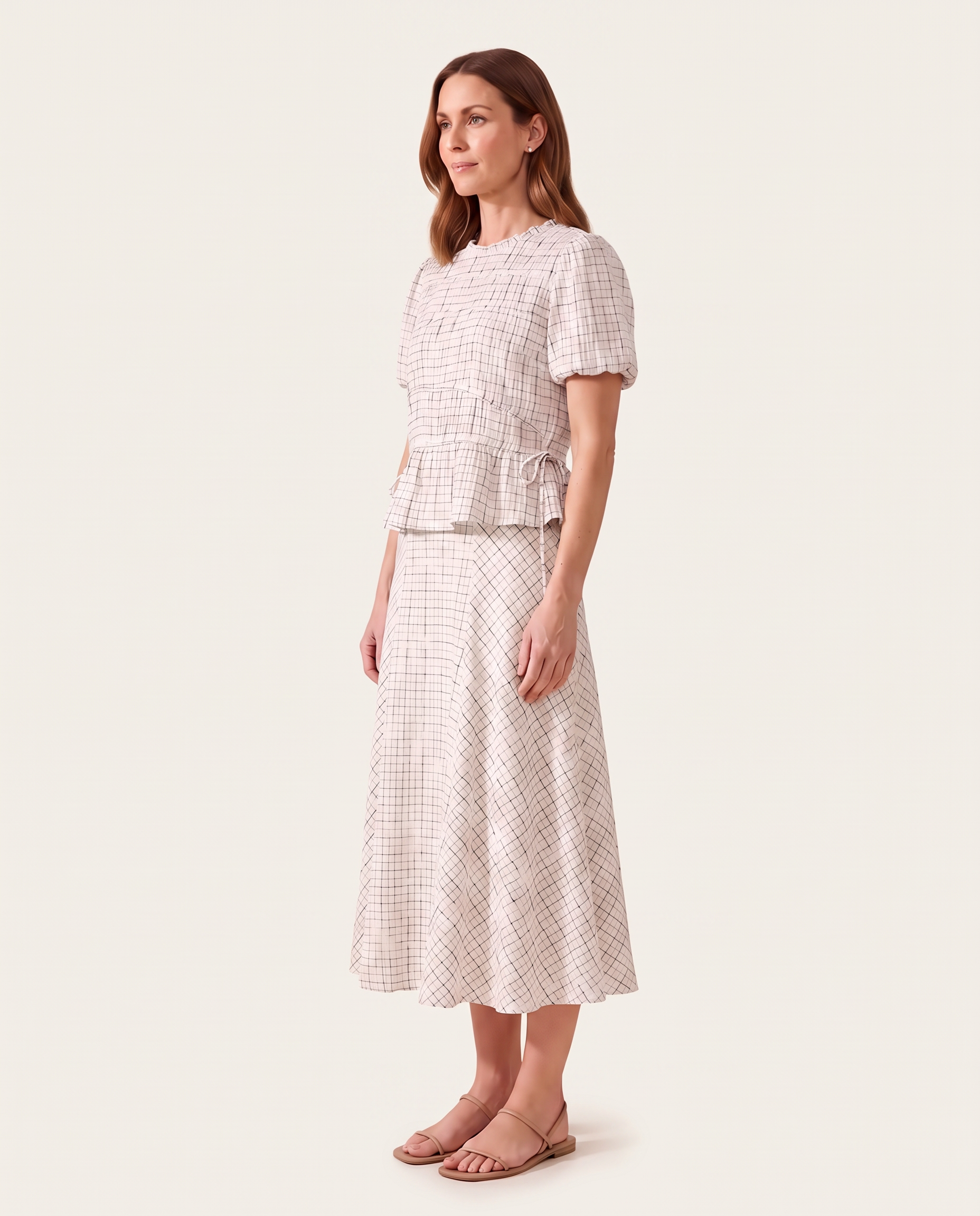 Kit checked top and midi skirt — three-quarter view with tan flat sandals