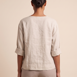 Linen Blouse with V Neck and Three Quarter Sleeves — full-length studio back view on a warm ivory seamless background