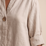 Linen Blouse with V Neck and Three Quarter Sleeves — tight editorial product detail showing the fabric texture, stitching, neckline and construction