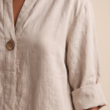 Linen Blouse with V Neck and Three Quarter Sleeves — tight editorial product detail showing the fabric texture, stitching, neckline and construction