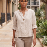 Linen Blouse with V Neck and Three Quarter Sleeves — natural full-body Australian lifestyle photograph on a refined Sydney streetscape in soft daylight