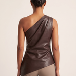 One Shoulder Top with Asymmetric Hem — full-length studio back view on a warm ivory seamless background