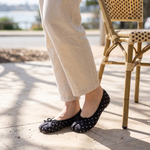 Polka Dot Ballet Flats with Bow — worn outdoors