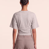 Relaxed Crop T Shirt with Crew Neck — full-length studio back view on a warm ivory seamless background