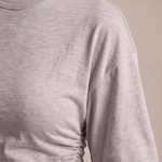 Relaxed Crop T Shirt with Crew Neck — tight editorial product detail showing the fabric texture, stitching, neckline and construction