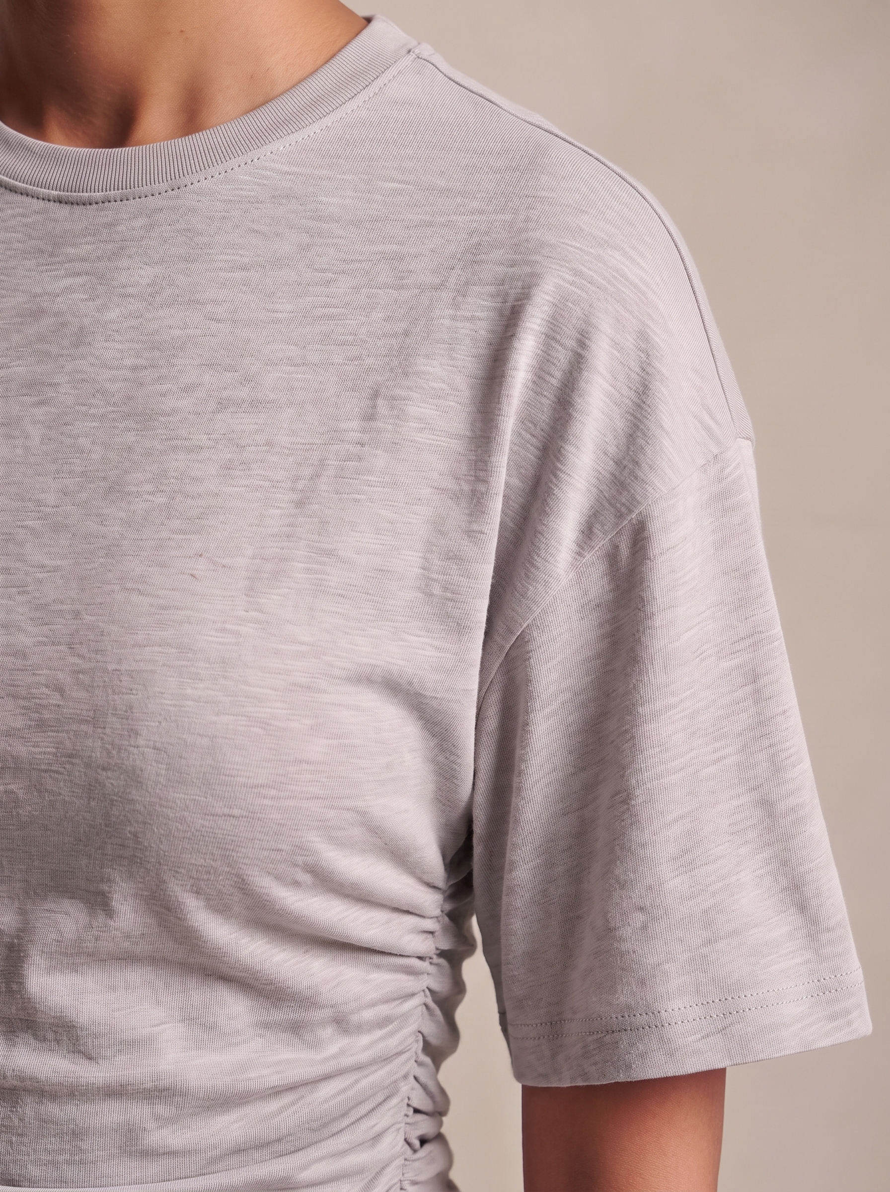 Relaxed Crop T Shirt with Crew Neck — tight editorial product detail showing the fabric texture, stitching, neckline and construction