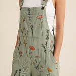 Botanical jumpsuit buckle and print detail