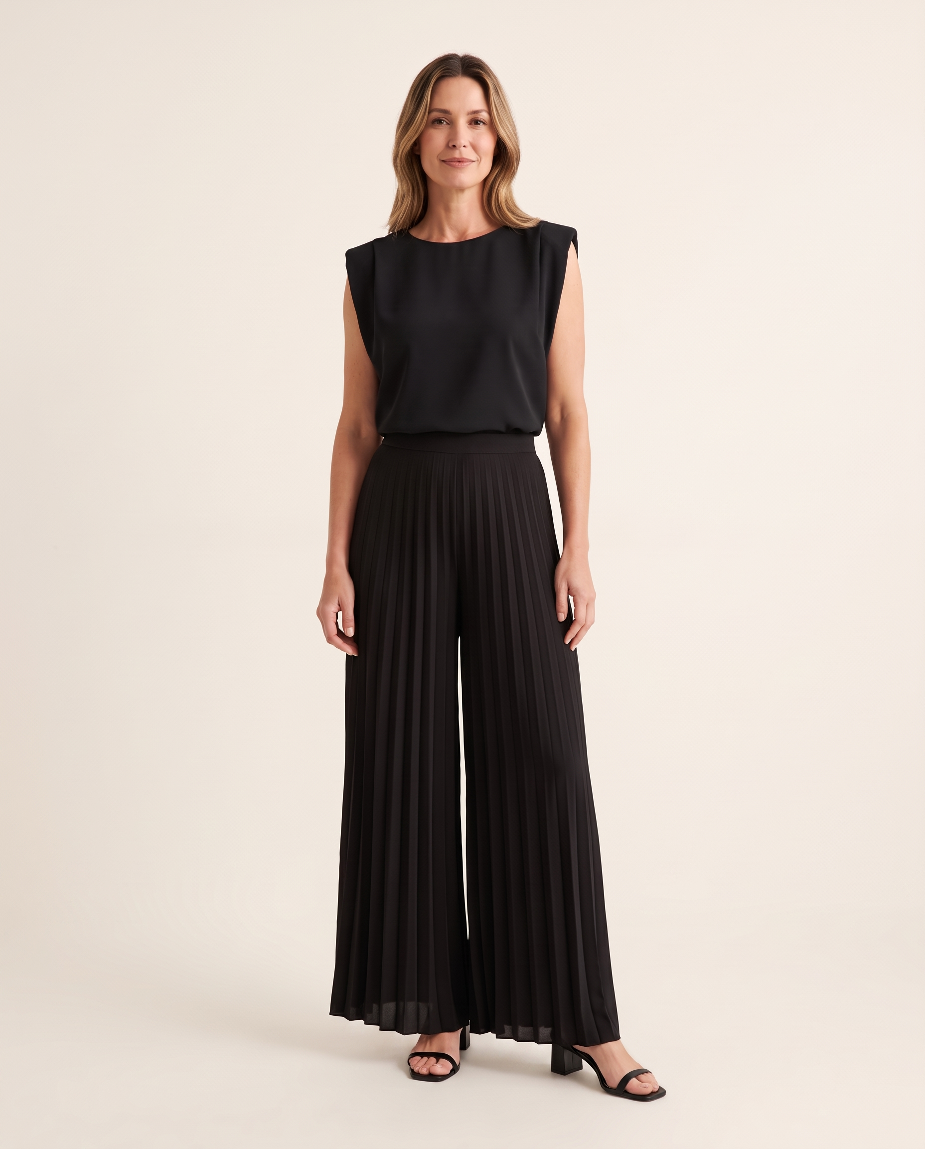Black floral pleated wide leg jumpsuit, front studio view