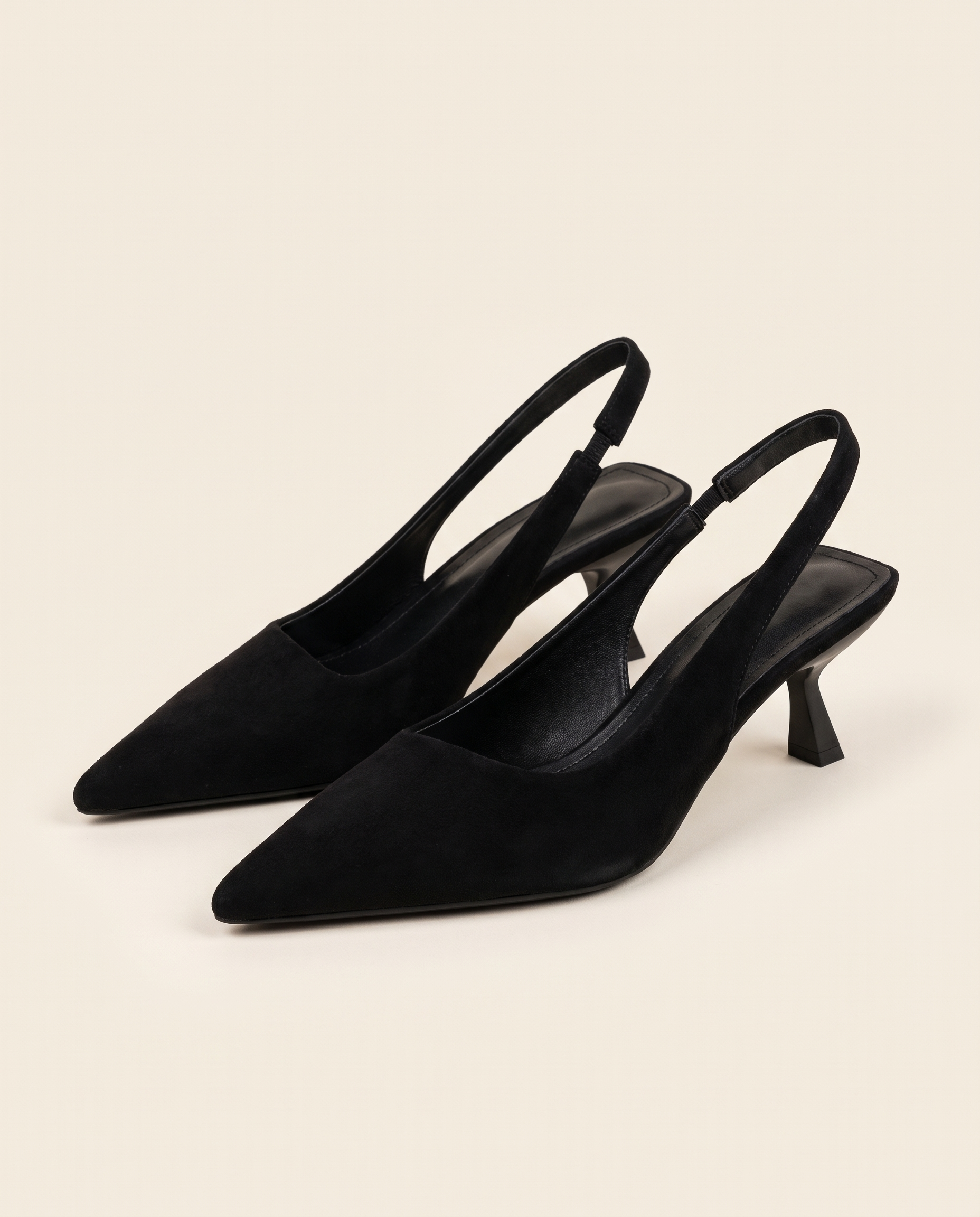 Cut-Out Pointed-Toe Slingback Heels — front view