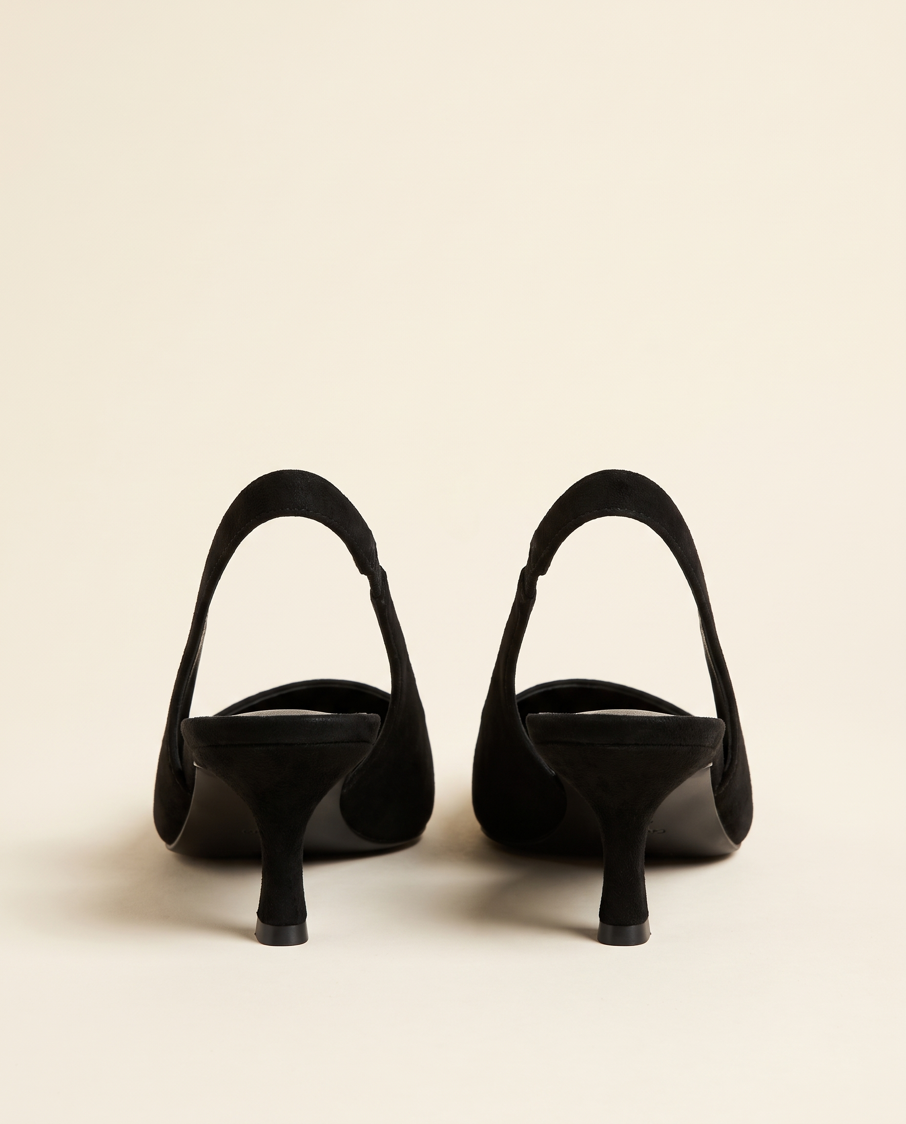 Cut-Out Pointed-Toe Slingback Heels — back view