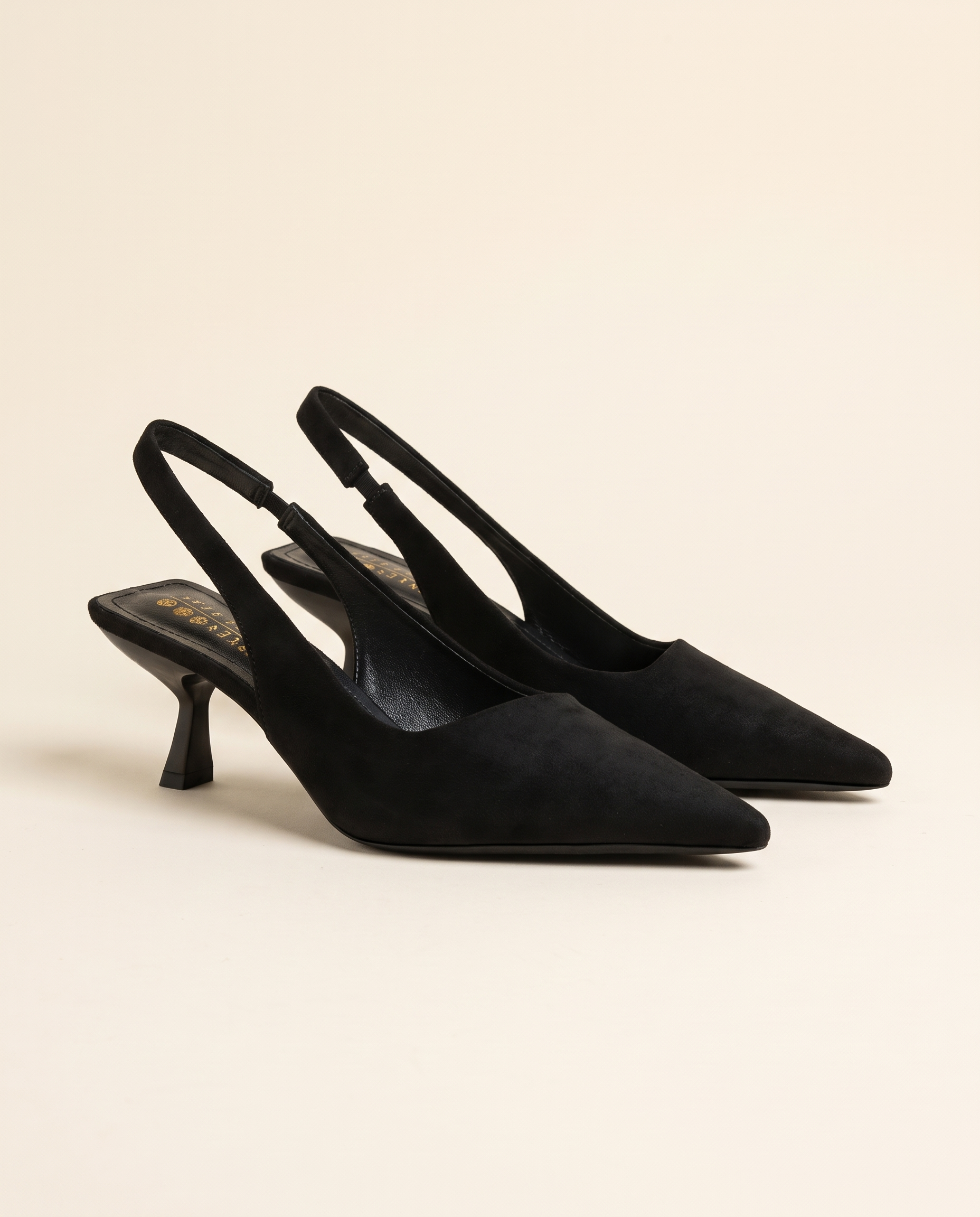 Cut-Out Pointed-Toe Slingback Heels — side view