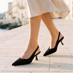 Cut-Out Pointed-Toe Slingback Heels — worn outdoors