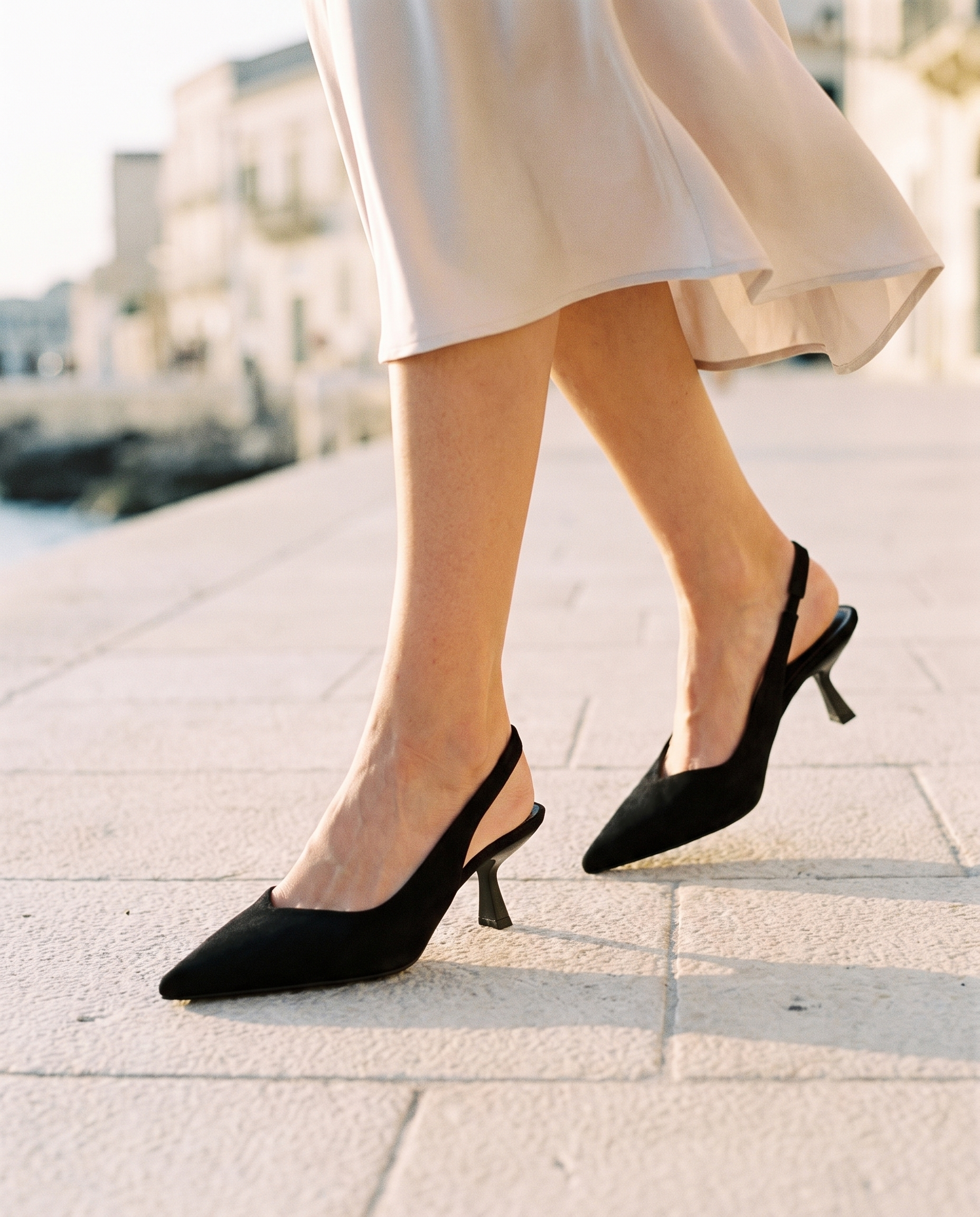 Cut-Out Pointed-Toe Slingback Heels — worn outdoors