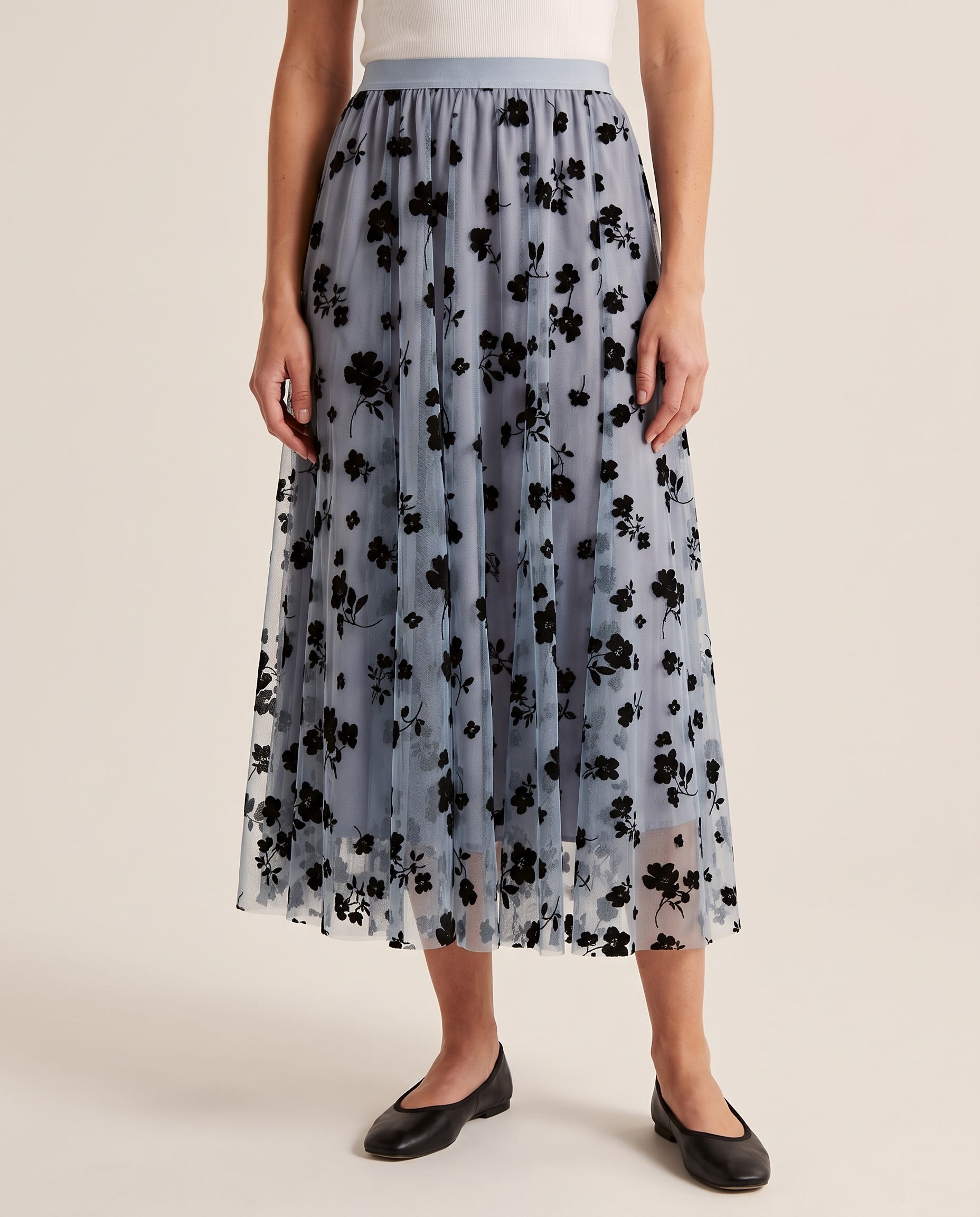 Floral Mesh Pleated Midi Skirt — three-quarter view
