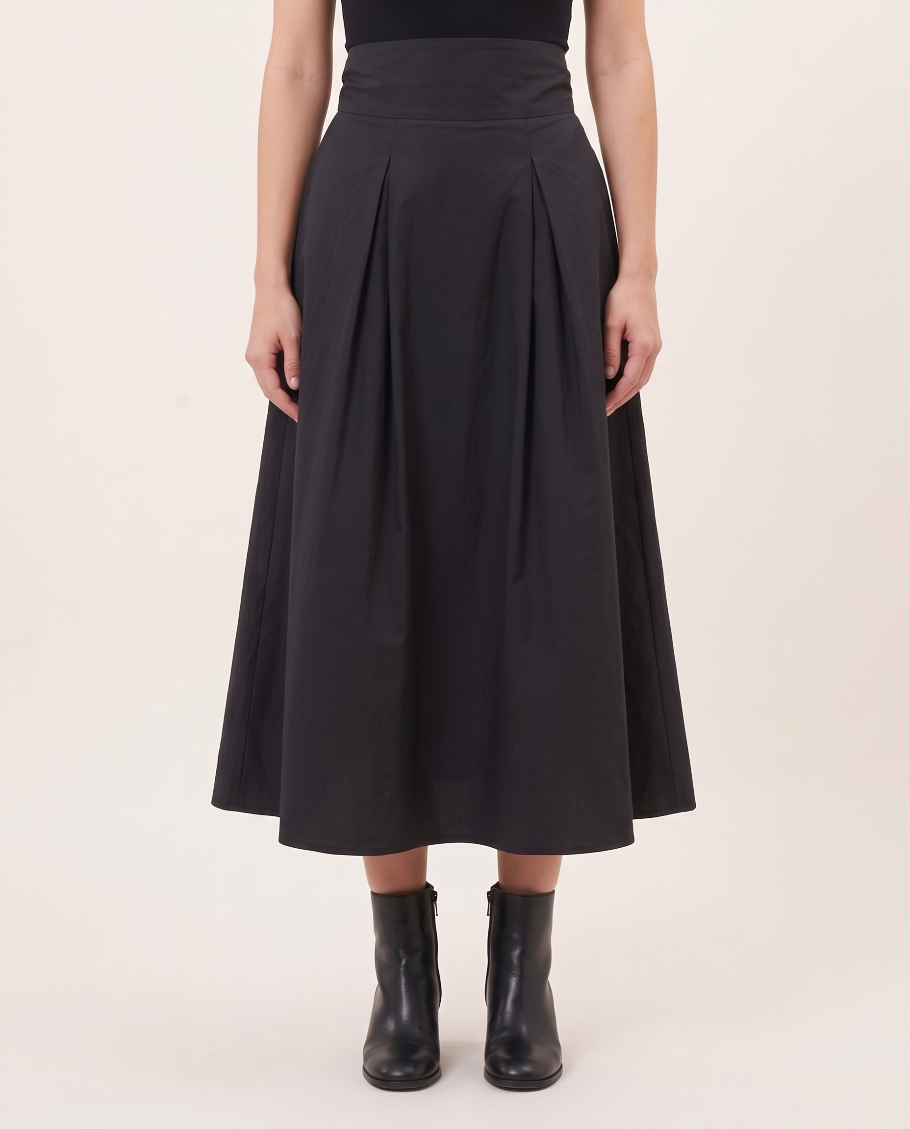 Solid Swing Maxi Skirt — Black studio front view