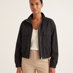 Onyx Relaxed High-Neck Zip Jacket – Black – studio front