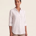 White linen button-front shirt — three-quarter view