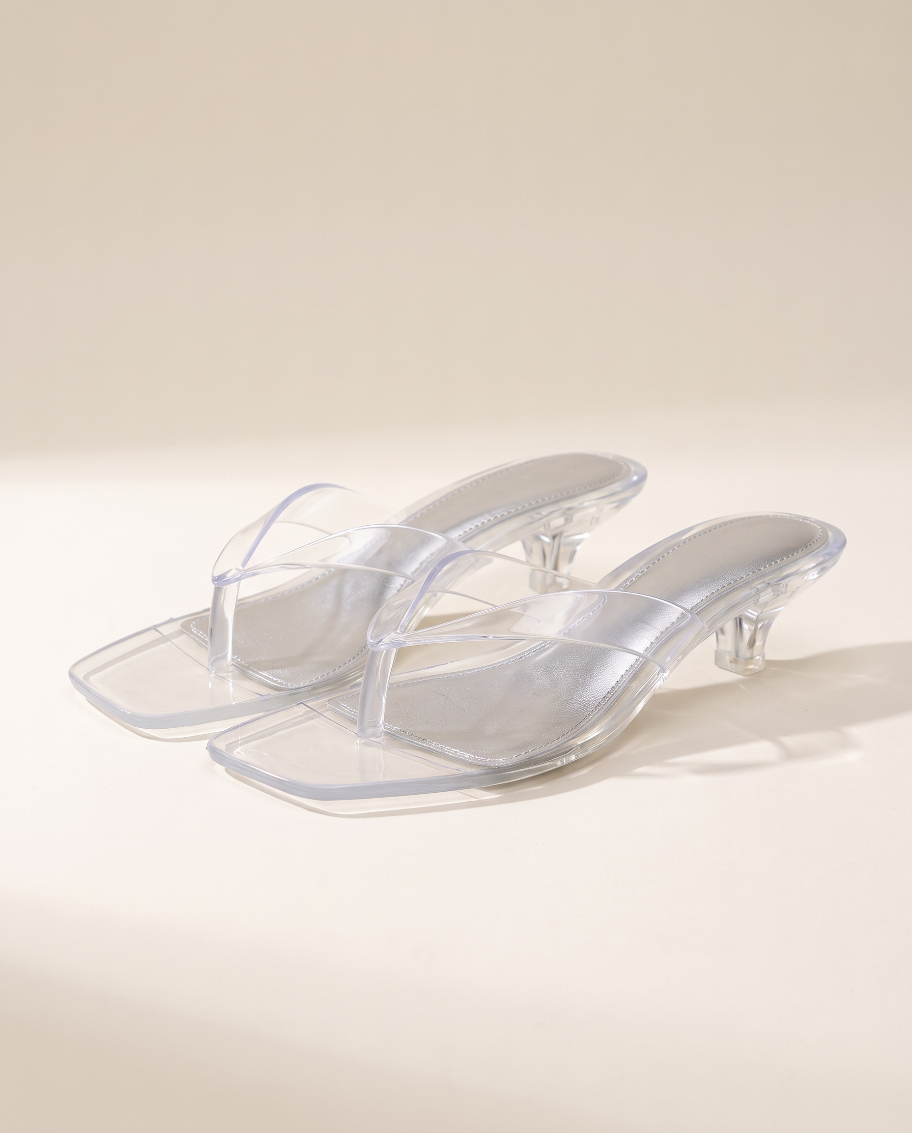 Clear square toe thong kitten heel sandals, matching pair