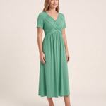 Roisin | Refined Figure-Flattering Dress — Green — studio three-quarter