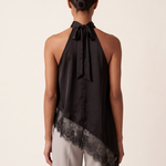 Satin and Lace Halter Top with Asymmetric Hem — full-length studio back view on a warm ivory seamless background