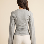 Slim Fit Long Sleeve Crop Top with Crew Neck — full-length studio back view on a warm ivory seamless background