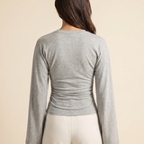 Slim Fit Long Sleeve Crop Top with Crew Neck — full-length studio back view on a warm ivory seamless background