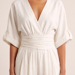 Surplice V-Neck Wide-Leg Jumpsuit — White — fabric detail