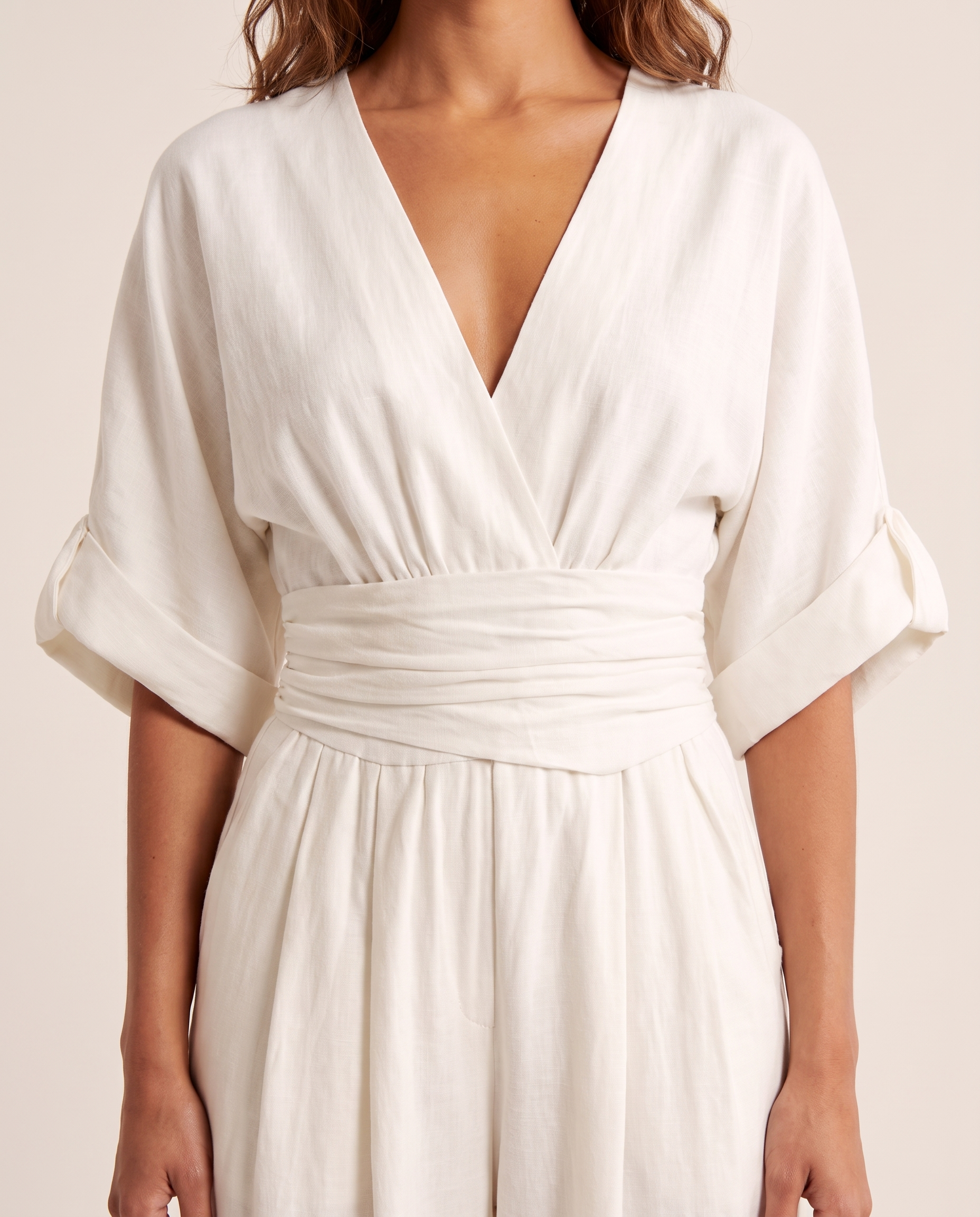 Surplice V-Neck Wide-Leg Jumpsuit — White — fabric detail