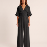 Surplice V-Neck Wide-Leg Jumpsuit — Black — studio front