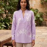 Xiomara | Floral High-Collar Blouse — Purple — courtyard lifestyle